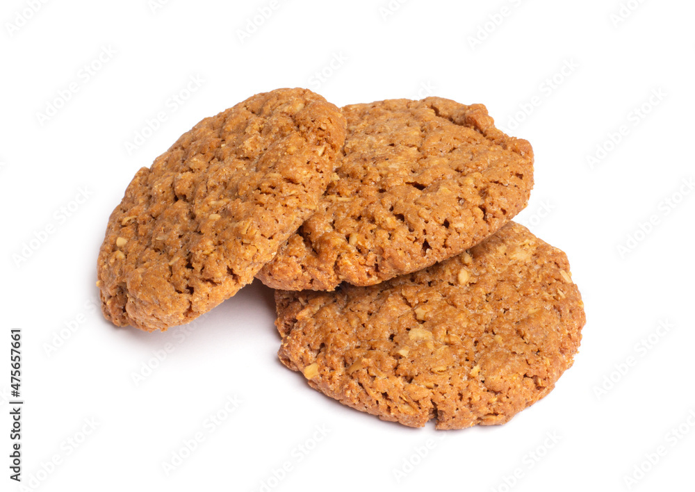 Oat vanilla sugar cookies isolated on white background. Close-up view of brown yellow snacks. Macro shot of beige biscuit cakes for your design Oat vanilla sugar cookies isolated on white background. Close-up view of brown yellow snacks. Macro shot of beige biscuit cakes for your design