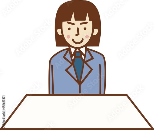 笑顔で座っている女性。