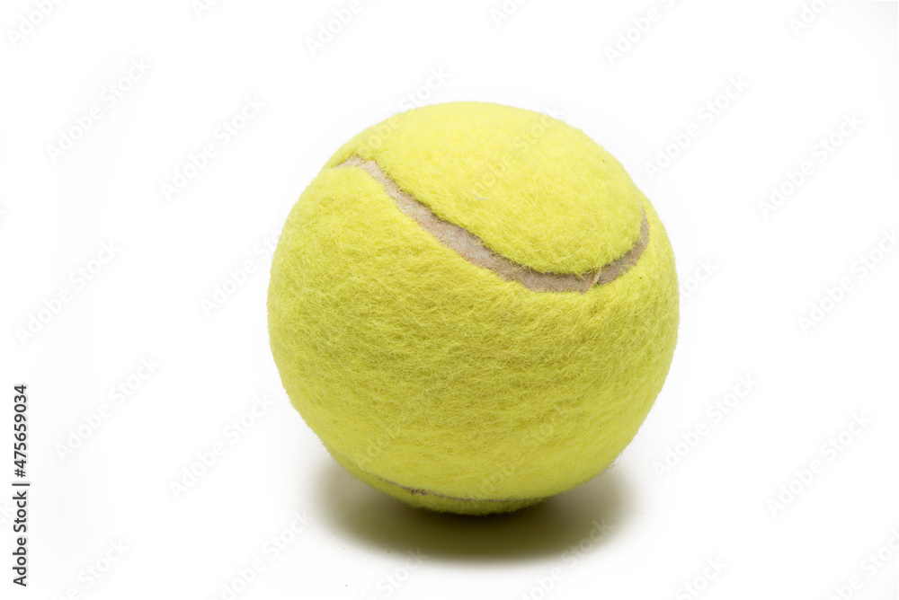Close up yellow tennis ball white background