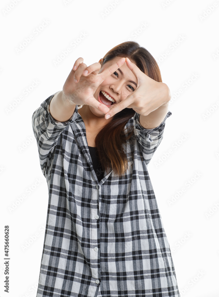 Portrait isolated closeup studio shot of Asian happy cheerful beautiful pretty long hair female model in black and gray plaid shirt wearing makeup standing smiling look at camera on white background Portrait isolated closeup studio shot of Asian happy cheerful beautiful pretty long hair female model in black and gray plaid shirt wearing makeup standing smiling look at camera on white background