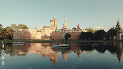 A beautiful landscape of the Laxenburg castle with the reflection on the water photo