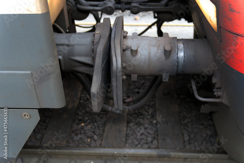 Close-up of train coupling at railway station on a foggy winter day. Photo taken December 17th, 2021, Zurich, Switzerland.