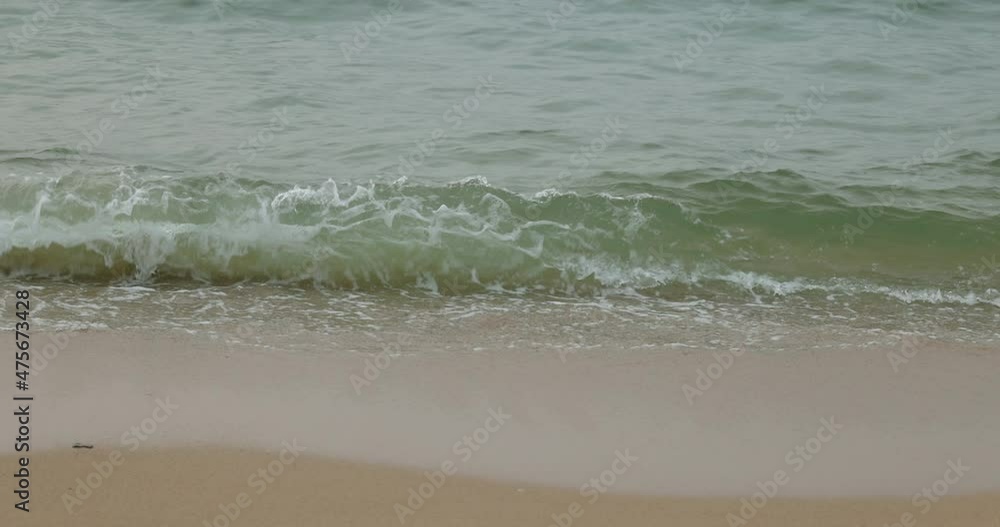 4K Video slow motion ocean wave movement on the beach at Pattaya Thailand. Concept for nature and outdoor seascape in Thailand.