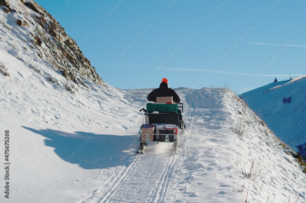 Snowmobile on a snowy road