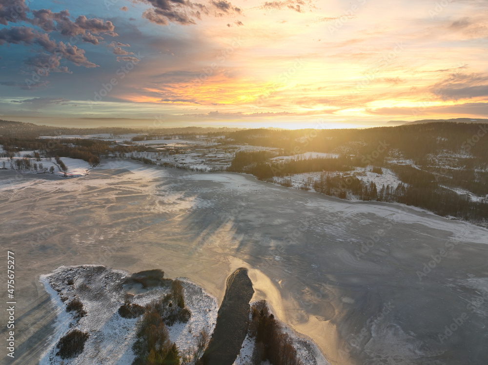 Sunrise over Oslo, Norway. Shot just outside of the city a winter morning in December. Shot high up in the sky with a drone. DJI Mavic 3 Sunrise over Oslo, Norway. Shot just outside of the city a winter morning in December. Shot high up in the sky with a drone. DJI Mavic 3