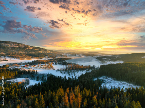 Sunrise over Oslo, Norway. Shot just outside of the city a winter morning in December. Shot high up in the sky with a drone. DJI Mavic 3