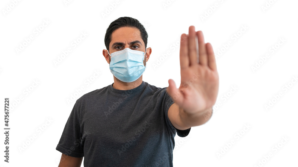 Man indicates with stop hand gesture wearing a face mask safe from coronavirus Man indicates with stop hand gesture wearing a face mask safe from coronavirus