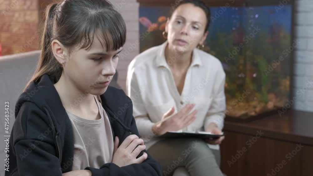 Mental care in childhood. A psychologist try to care teen's mental health in the cabinet. Mental care in childhood. A psychologist try to care teen's mental health in the cabinet.