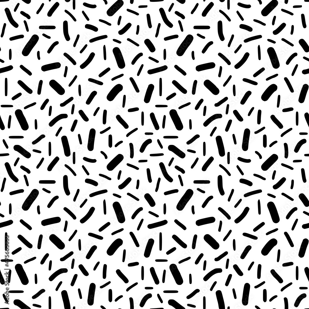 Seamless pattern. Black dashes in chaotic order on a white background.	