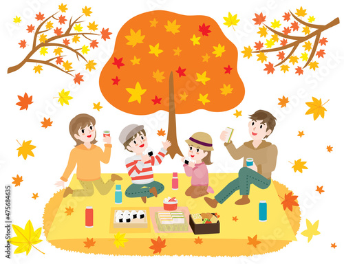 紅葉狩りをしながらお弁当を食べる家族