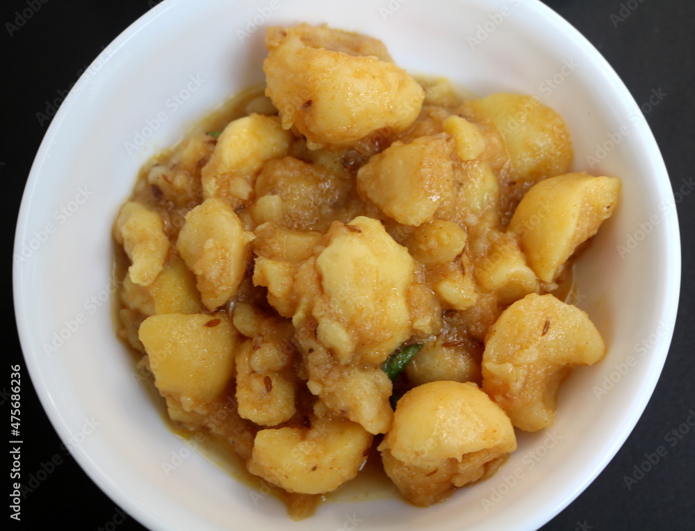 Bengali traditional Alur dom. It also known as aloor dum or alur dom is a lightly spiced and slightly sweet potato curry.