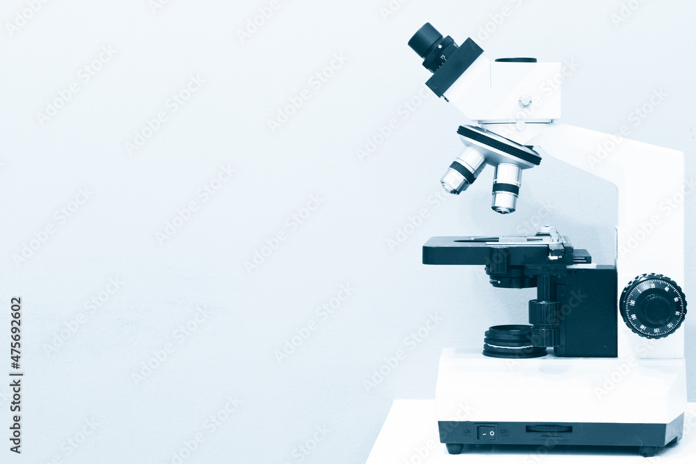 Microscope on the Table in Laboratory Room