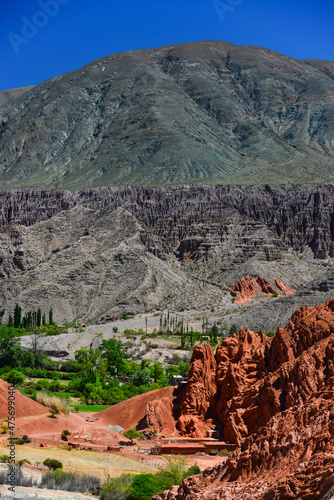 Hiking through the colorful landscapes around the town of Purmamarca, Quebrada de Humahuaca, Jujuy Province, northwest Argentina