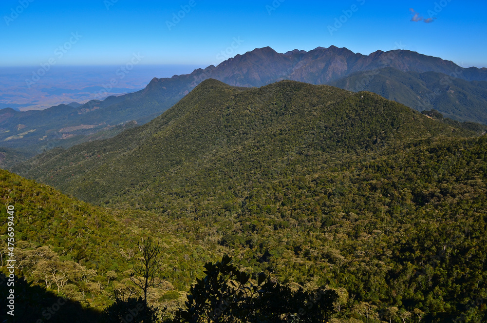 Lush rainforest slopes and the Serra Fina massif on the way to the high sector of Itatiaia National Park, Itatiaia, Rio de Janeiro, Brazil