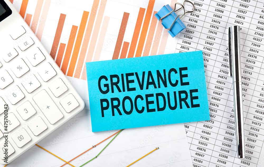 GRIEVANCE PROCEDURE text on the sticker on diagram background GRIEVANCE PROCEDURE text on the sticker on diagram background