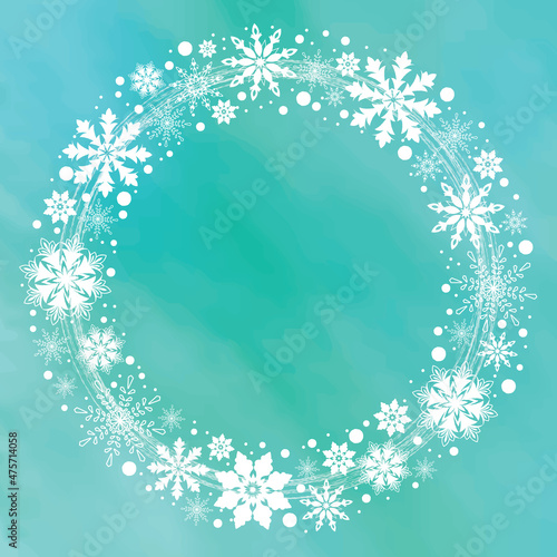 Winter snowflake wreath isolated on an aqua blue background. Illustration of white icy snowflakes in a circular motion pattern. Frosty winter background.