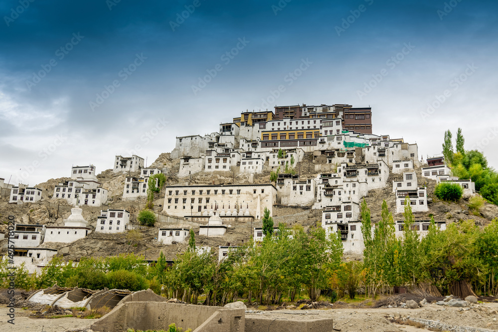 Thiksay monastery on Himalayan mountians and blue sky in the background - it is a famous Buddhist temple in,Leh, Ladakh, Jammu and Kashmir, India.