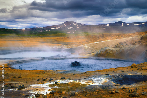 Steaming and bubbling mud pool in the Hverir geothermal area in Iceland