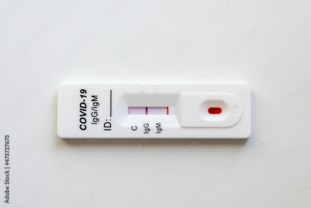 Quick blood test shows a positive result for antigens for SARS-CoV-2 virus. Test for viral disease COVID-19 2019-nCoV (coronavirus). Quick blood test shows a positive result for antigens for SARS-CoV-2 virus. Test for viral disease COVID-19 2019-nCoV (coronavirus).