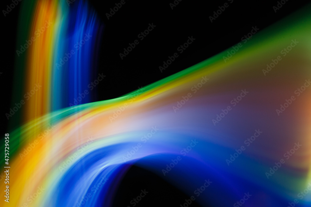 Colored blurred light lines. Abstraction of light. Colored blurred light lines. Abstraction of light.