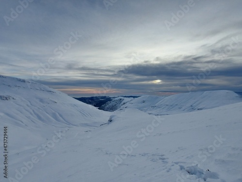 snow covered mountains © Teodor