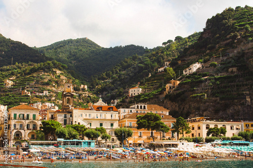 Fototapeta Shot from the water of a small mountainous town and its' beach on the Amalfi coast, Italy