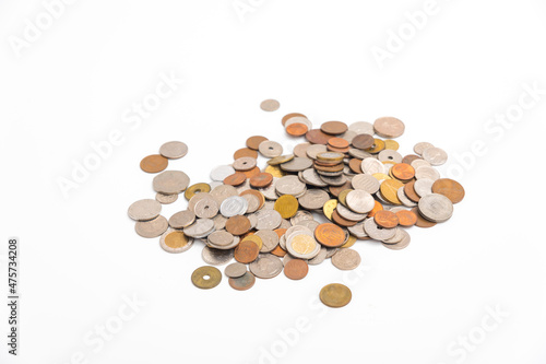 Many kind of coin country pile up on white background. photo