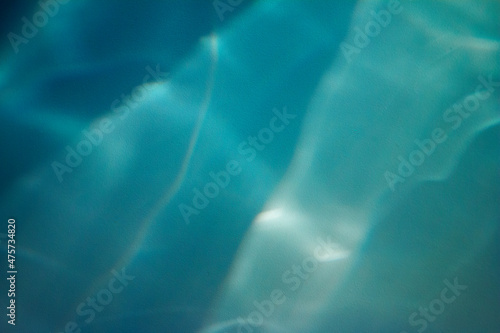 Beautiful watercolor background with stains. White backing with blue stains of paint.