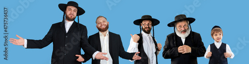 Fotografie Set of portraits of mixed aged emotional men, orthodox jewish men standing together on blue background