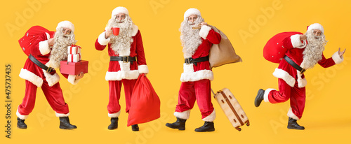 Santa Claus with bag on yellow background © Pixel-Shot