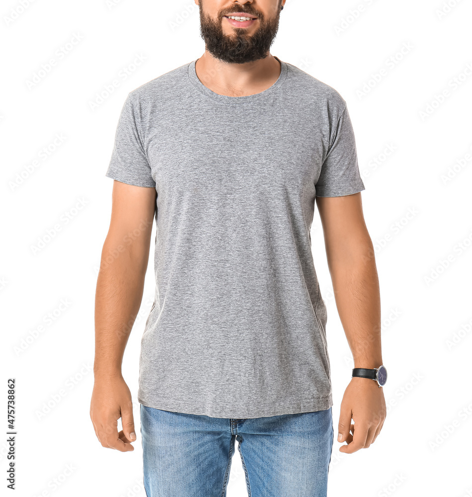 Handsome man in grey t-shirt on white background Handsome man in grey t-shirt on white background