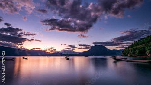 Landscape of Lugu Lake with long exposure during the sunset in Sichuan, China photo