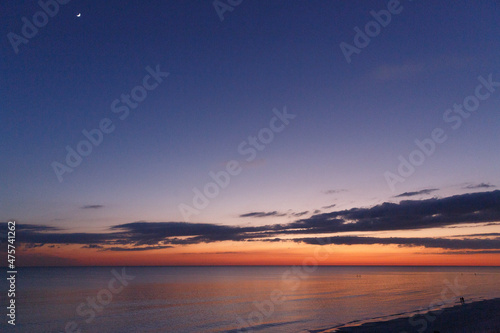 Landscape of the beautiful sea during a breathtaking sunset in Rosemary Beach, Florida photo