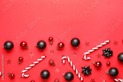Beautiful Christmas composition with decor on red background