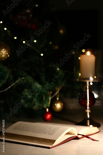 book and candle on the table