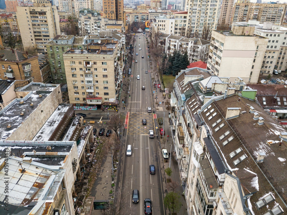 Fototapeta premium City street in Kiev in cloudy weather. Aerial drone view.