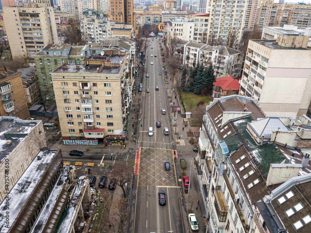Fototapeta premium City street in Kiev in cloudy weather. Aerial drone view.