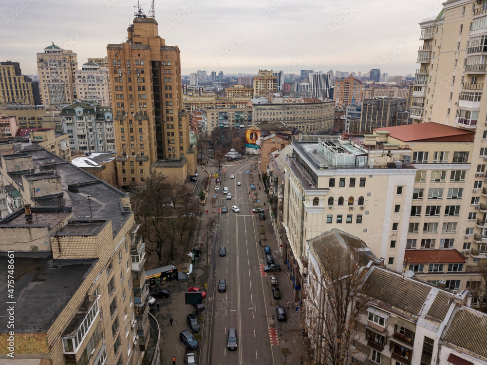 Fototapeta premium City street in Kiev in cloudy weather. Aerial drone view.