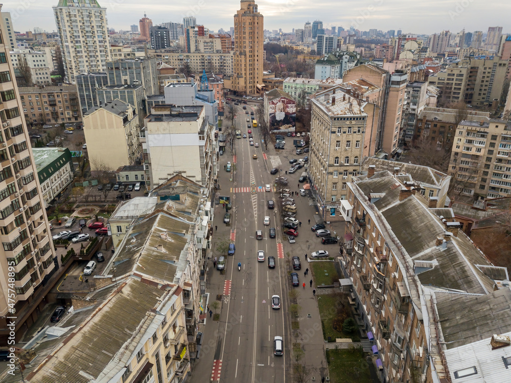 Fototapeta premium City street in Kiev in cloudy weather. Aerial drone view.