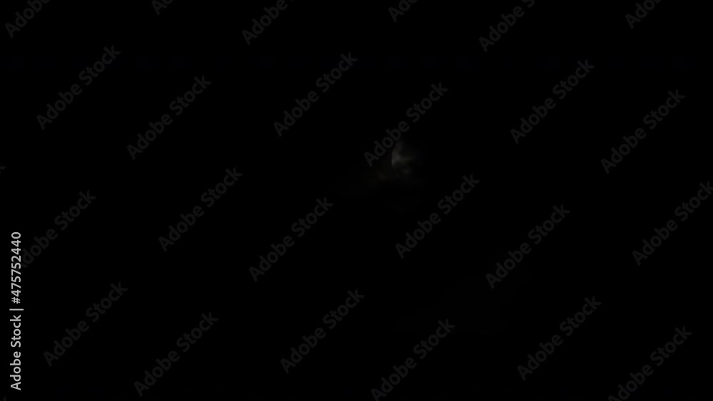 Timelapse - bright moon rising against black dark sky at night with moving clouds - waxing gibbous phase. Time lapse, astronomy, mystical, halloween, moonrise and nature concept Timelapse - bright moon rising against black dark sky at night with moving clouds - waxing gibbous phase. Time lapse, astronomy, mystical, halloween, moonrise and nature concept