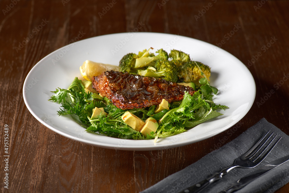 popular grilled stingray fish with spices and vegetable, in Malaysia popular grilled stingray fish with spices and vegetable, in Malaysia