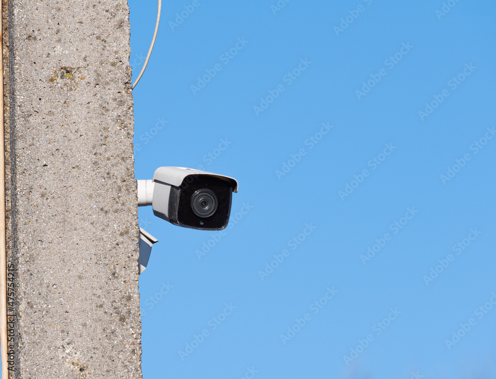 Surveillance camera mounted on a pole. Video camera surveillance. Surveillance camera mounted on a pole. Video camera surveillance.