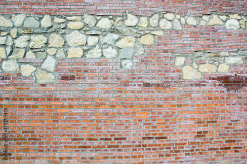 Old wall built of red bricks.
