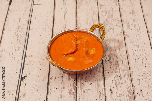 Butter chicken is an Indian Panjab dish, popular in countries around the world. The origins of butter chicken can be traced back to Mumbai at the time of the Mongol empire photo