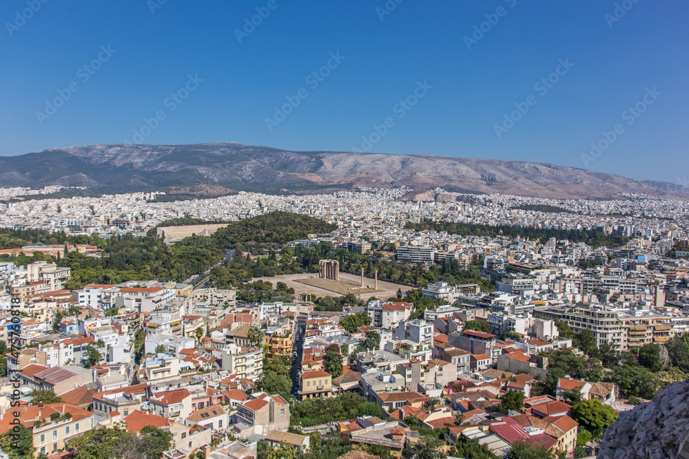 A panoramic view of Athens, Greece showing the Temple of Olympian Zeus.