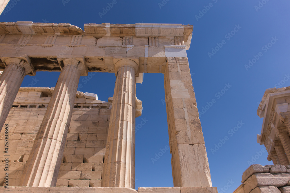 Columns of the Temple of Athena Nike at the entrance of the Acropolis in Athens, Greece.