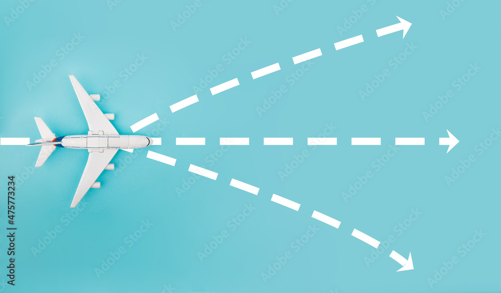 Fototapeta premium Plane and white arrows