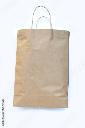 Brown paper bag on white background.