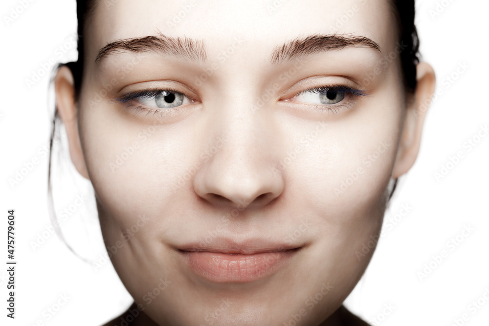 studio portrait of a beautiful young woman against white backgroung studio portrait of a beautiful young woman against white backgroung