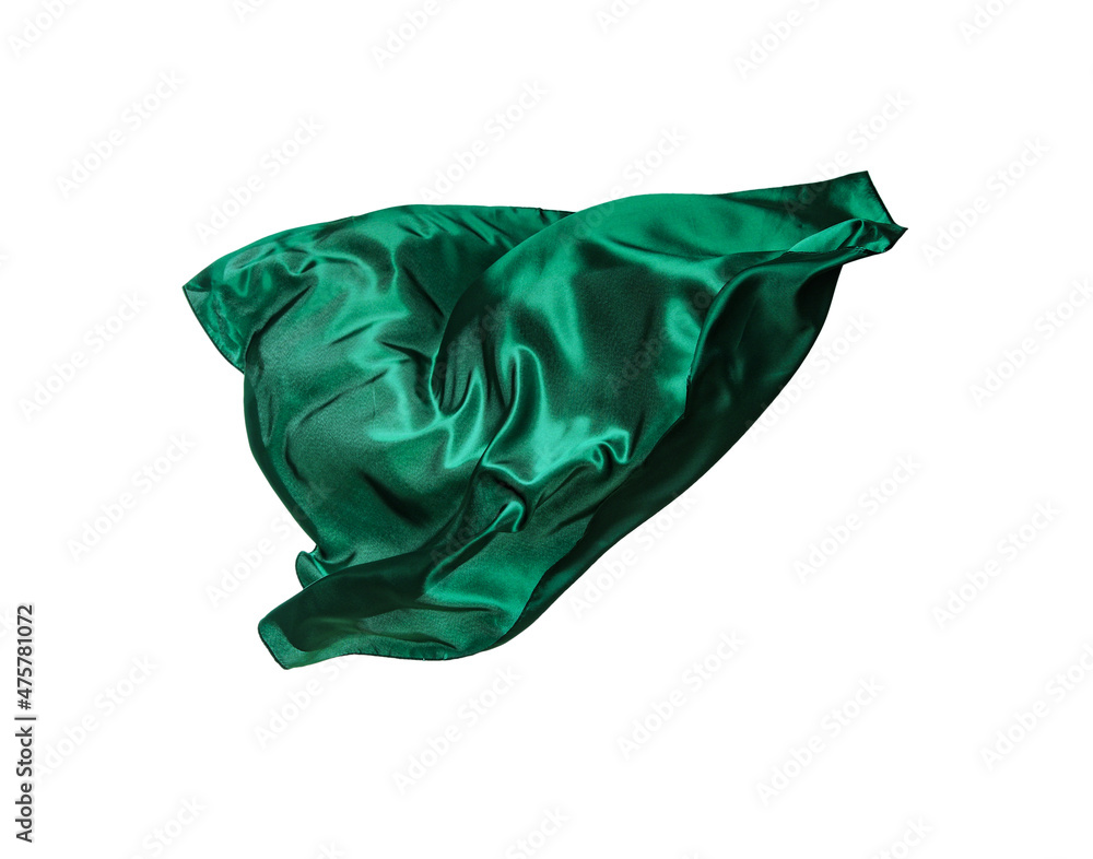 Fototapeta premium Beautiful delicate green silk floating on white background